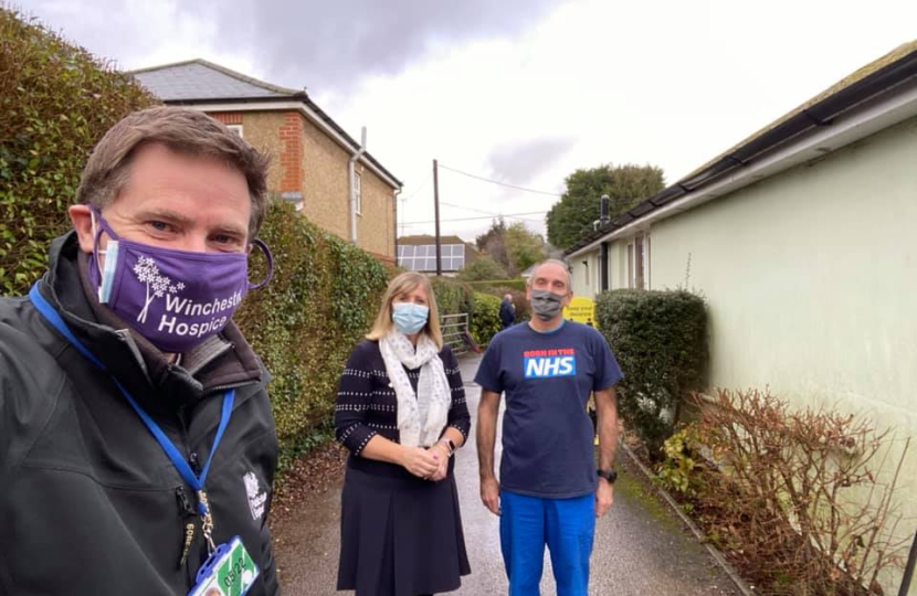 Pictured; Steve Brine with members of the team