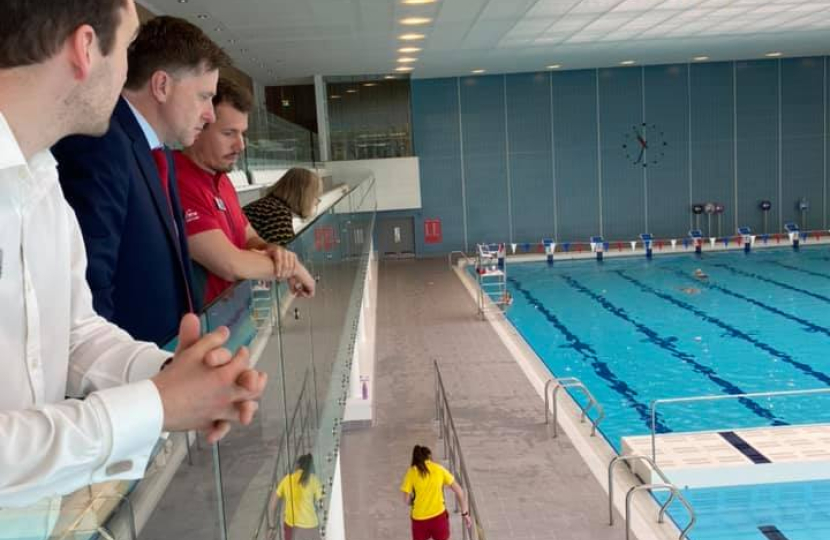 Pictured; Steve Brine with Craig and Ashley overlooking the pool
