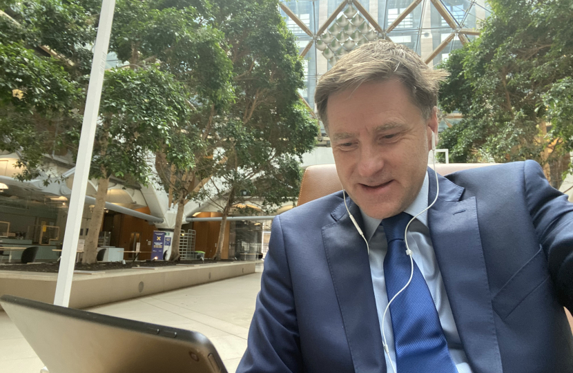 Steve Brine in the Atrium at Portcullis House enjoying the event with members of the Christ Church community.