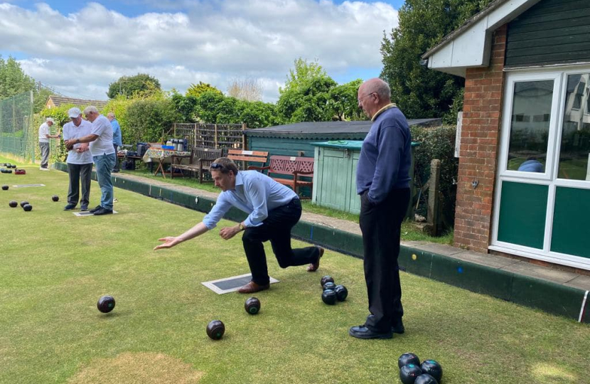 Pictured; Steve Brine MP with club members, giving bowls ago