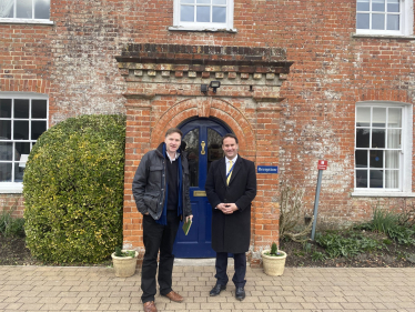 Pictured; Steve Brine MP with headmaster Andrew Harvey outside the school office