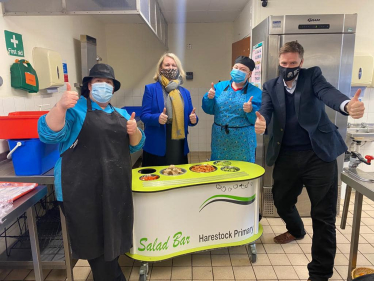 Steve Brine with the headteacher and dinner ladies