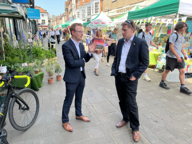 Pictured; Steve Brine MP and Paul Spencer talking on Winchester High Street.