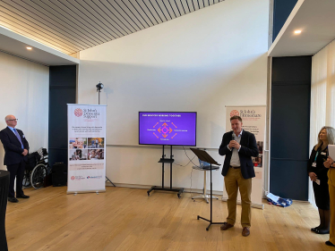 Steve Brine MP on his feet speaking to the event