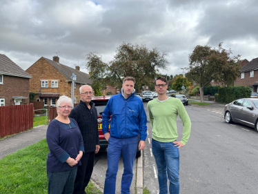 Pictured; Steve Brine MP with Sam Feltham and Mr and Mrs Mears on Garbett Road, Winnall.